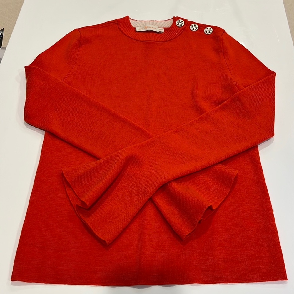Tory Burch lightweight wool sweater logo buttons.